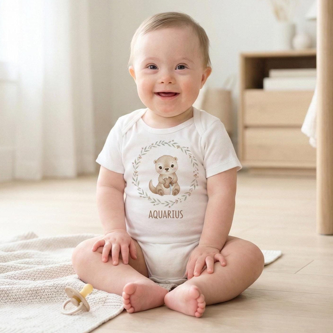 Aquarius zodiac baby onesie featuring a soft neutral boho watercolor design on a bright white background. Unisex astrology baby outfit perfect for January and February birthdays, newborn photos, baby shower gifts, and horoscope-themed milestone pictures. High-quality printable zodiac artwork for infant clothing and personalized baby gifts.