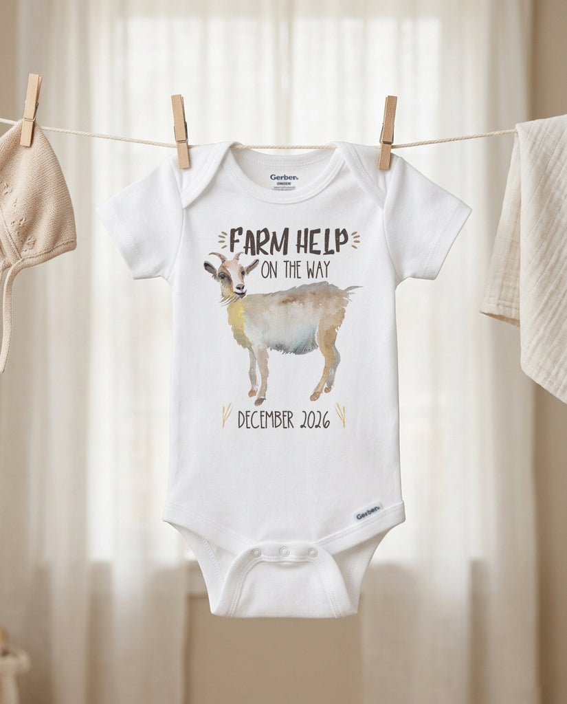 Baby onesie with a goat illustration and text on a clothesline.