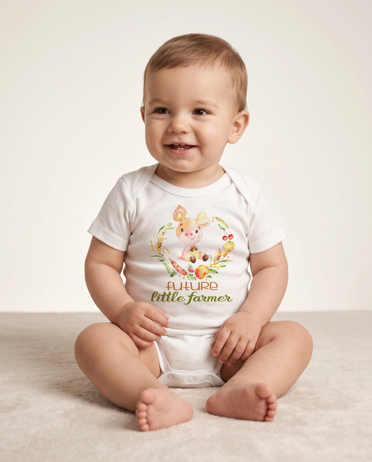 Baby wearing a 'Future Little Farmer' onesie on a light background