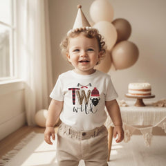 Two Wild Birthday Shirt.  This adorable Lumberjack Theme Birthday Boy design features a black beard with a lumberjack beanie and buffalo plaid accents and some lumberjack axes.  The words read "Two Wild"  This is such an adorable shirt for your little man's birthday celebration!  Makes a great birthday gift for the little lumberjack in your life!