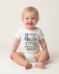 This adorable uncle theme bodysuit or t-shirt features fun handwritten-style fonts with the phrase "My cute Uncle is single. Wanna be my Auntie?".  Such a cute gift for your niece or nephew!  Let this custom designed shirt do the talking!  This cute Uncle bodysuit or t-shirt also makes a wonderful baby shower gift!