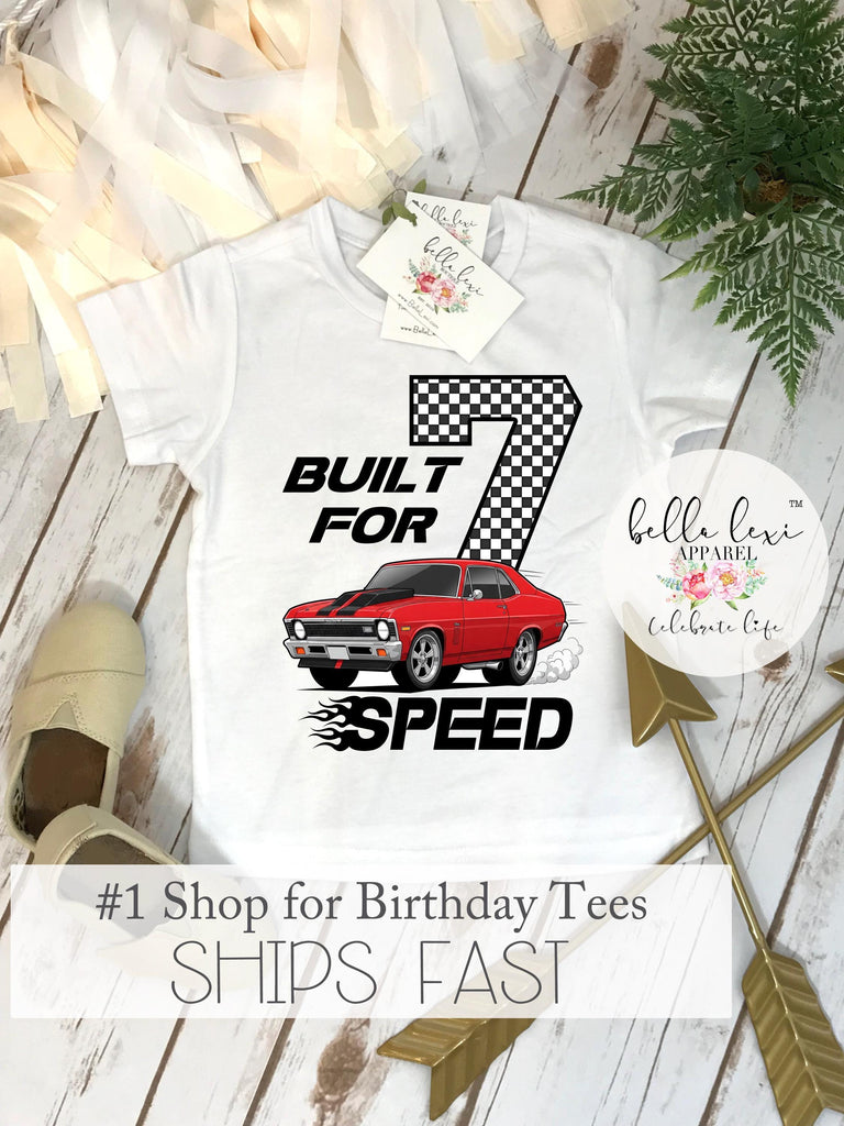 White short sleeve kids t-shirt flat lay with "Built for Speed" design, displayed on a white background for a race car 7th birthday theme.