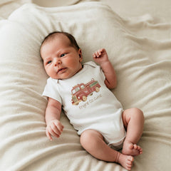 Firefighter Baby Outfit, Engine Co. Cutie Onesie®, First Responder Shower Gift, Baby Shower Gift, Fireman Baby Reveal, Fireman Baby Theme. Your little hero just rolled onto the scene! This “Engine Co. Cutie” onesie is the perfect outfit for firefighter families and first responder parents who want to celebrate their newest recruit. The cozy fit and vintage firetruck design make it a heartwarming baby shower gift or everyday outfit for your brave little cutie.