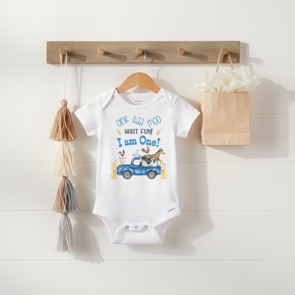 "OINK BAA MOO, What fun! I'm am ONE!" This is such an adorable farm theme birthday shirt!  Perfect for your little man's First Birthday Party! This design features a cute blue truck and watercolor style animals with the words "oink baa moo What fun! I am one!"  Perfect for a farm theme birthday! Also makes a great gift!  This design is printed directly into the garment of your choice.  Makes a great 1st birthday gift!
