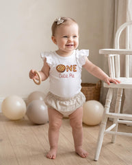 one cutie pie fall birthday outfit for cake smash sessions for a first birthday girl