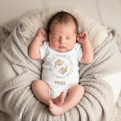 Pisces zodiac baby onesie with a soft boho watercolor design on a bright white background. Unisex astrology baby outfit perfect for February and March birthdays, newborn photos, baby shower gifts, horoscope-themed milestone pictures, and gender-neutral baby clothing. High-quality printable zodiac artwork for infant apparel.